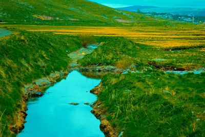 Scenic view of lake amidst landscape