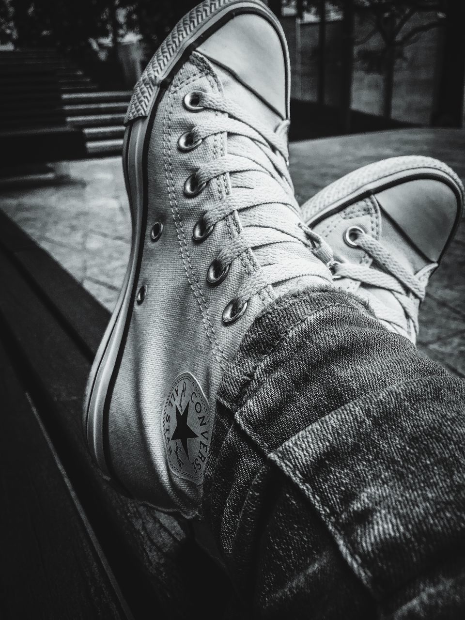 shoe, low section, close-up, person, jeans, focus on foreground, part of, footwear, personal perspective, outdoors, day, fashion, men, pair, wearing, unrecognizable person, sunlight