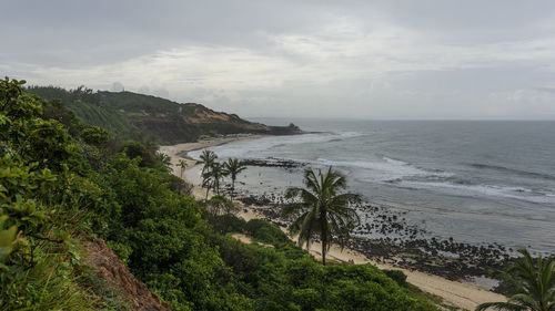 Scenic view of beach and sea against sky