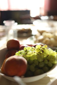 Close-up of fruits in plate on table