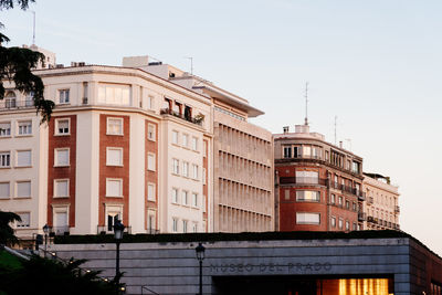 Low angle view of buildings against clear sky