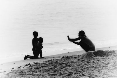 Men on beach