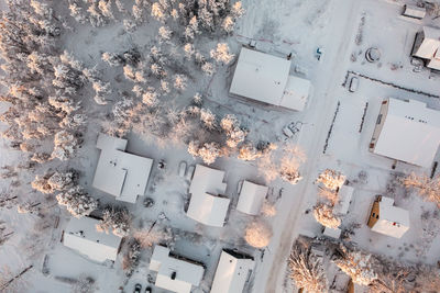 Suburban view from above with small houses and snow in espoo, finland