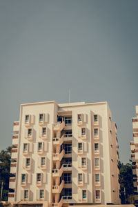 Exterior of apartment building against sky