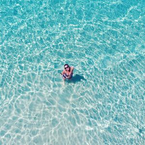 High angle view of person swimming in pool