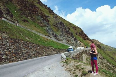 Country road leading towards mountains