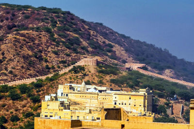 High angle view of buildings against mountain