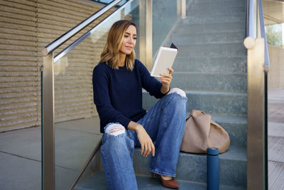 Young woman using mobile phone