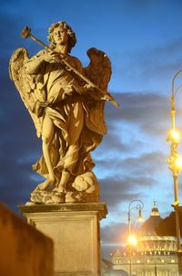 Statue of angel at saint angel bridge in rome