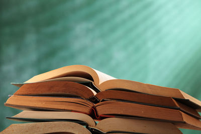 Close-up of books against wall