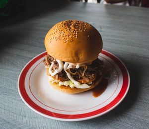 Close-up of burger in plate on table