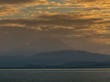 Scenic view of mountains against sky during sunset