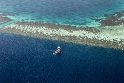 Coral reef and detail of atoll in indian ocean, maldives, view from seaplane window