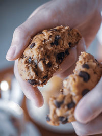 Close-up of hand holding cookie