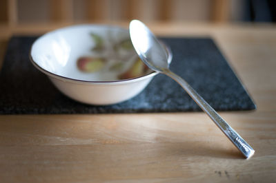 Close-up of spoon in bowl on table