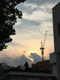 Low angle view of communications tower against sky