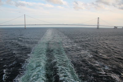 View of suspension bridge over sea