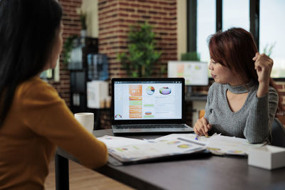 Businesswoman working at office