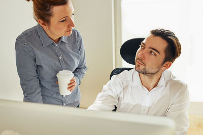 Business colleagues working at office