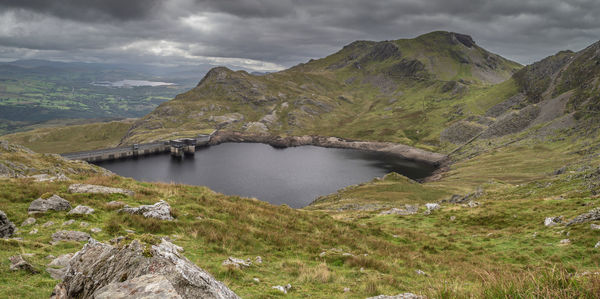 Stwlan dam and the moelwyn mountains near blaenau ffestiniog in snowdonia.