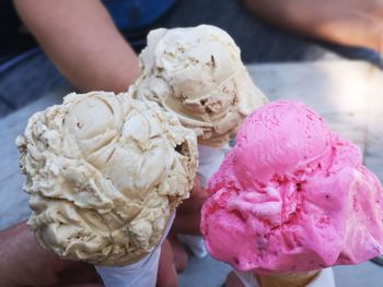 People holding ice cream