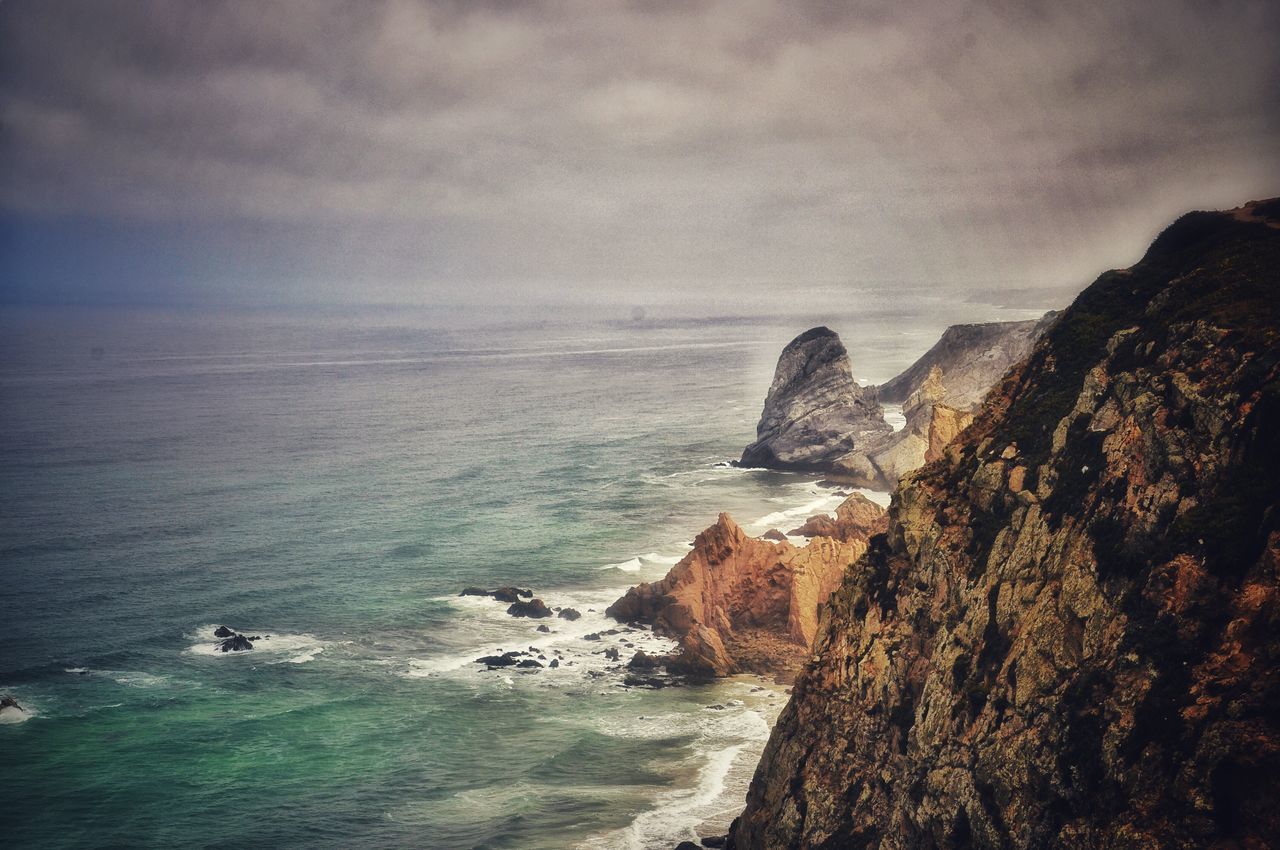 sea, water, sky, horizon, beauty in nature, horizon over water, cloud - sky, scenics - nature, land, rock, nature, beach, tranquil scene, sport, rock - object, solid, tranquility, motion, day, no people, outdoors, stack rock, rocky coastline