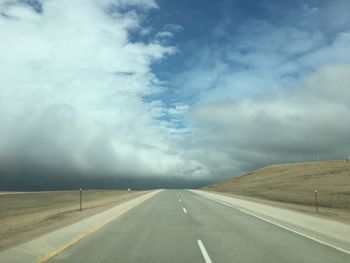 Empty road along landscape