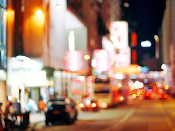 Defocused image of traffic on road at night