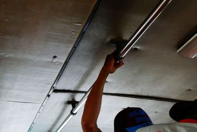 Low section of man skateboarding