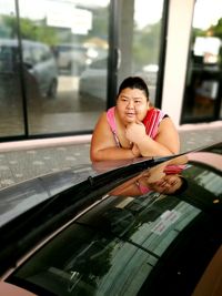 Woman sitting in car