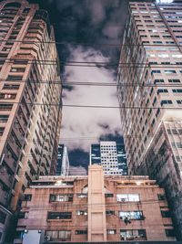 Low angle view of modern buildings against sky