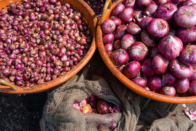 High angle view of onions in market stall