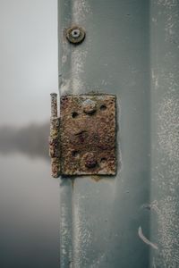 Close-up of rusty metal door