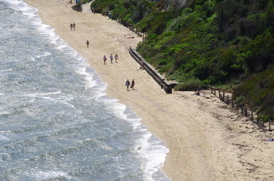 High angle view of people on beach against sky