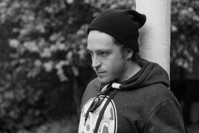 Portrait of young man standing outdoors