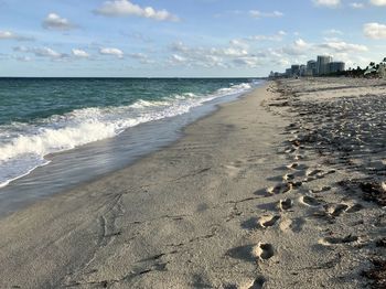 Scenic view of beach against sky