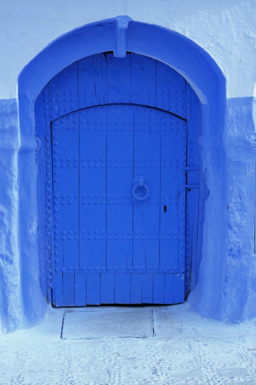 BLUE DOOR OF BUILDING