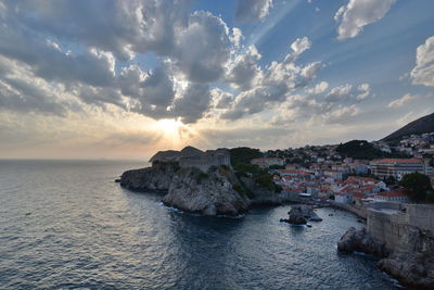 Scenic view of sea against sky during sunset