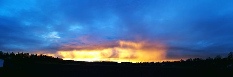 Scenic view of dramatic sky during sunset