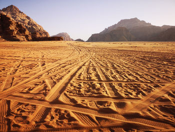 Scenic view of desert against clear sky