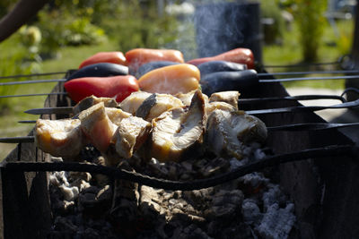 Close-up of meat on barbecue grill