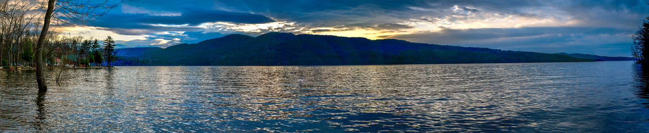 Scenic view of lake against sky during sunset