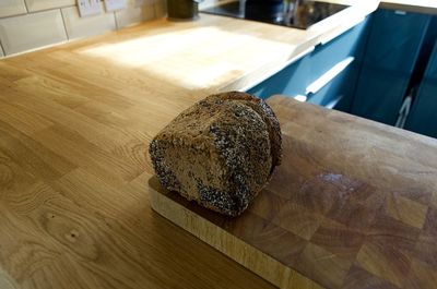 High angle view of bread on cutting board