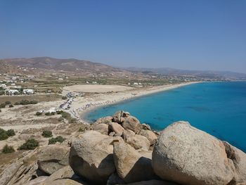 Scenic view of sea against clear blue sky