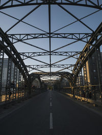 View of bridge over road in city