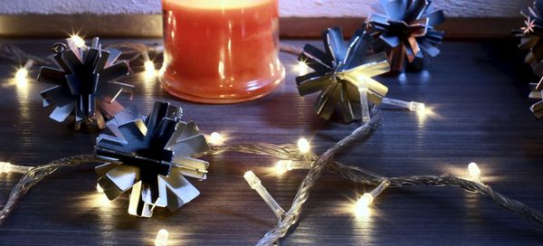 Illuminated christmas lights on table