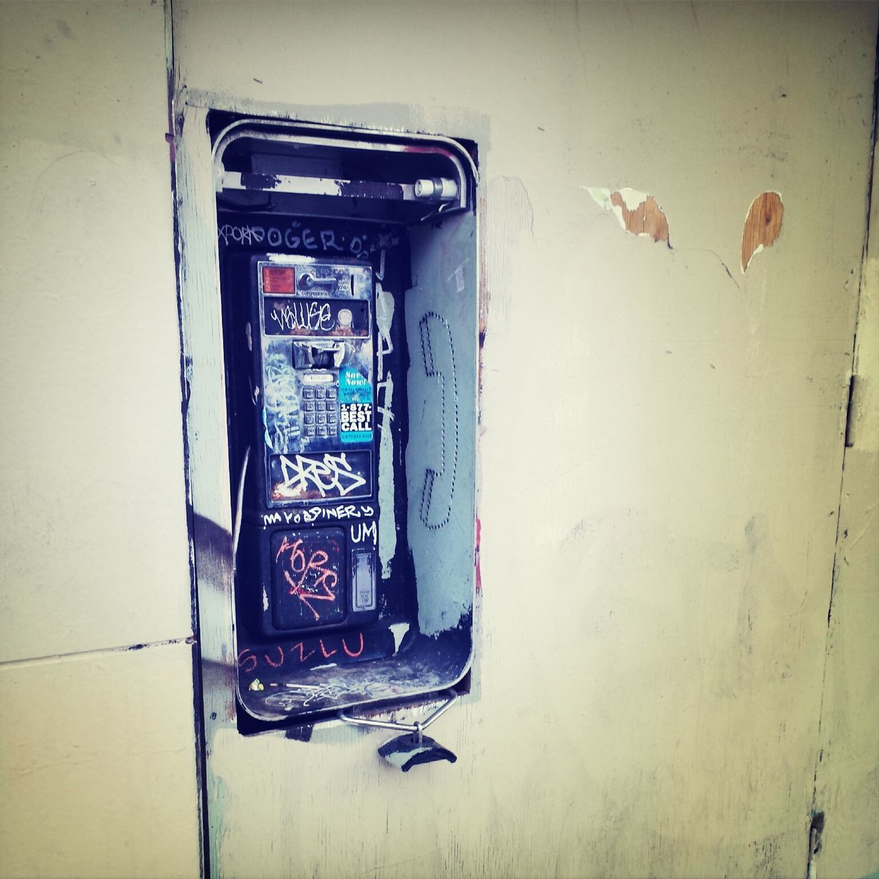 wall - building feature, indoors, communication, wall, text, built structure, door, architecture, transportation, abandoned, old, graffiti, obsolete, western script, technology, no people, damaged, closed, day, mode of transport