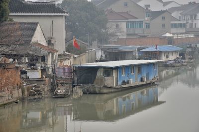 Floating home on a river in tongli, water town in china