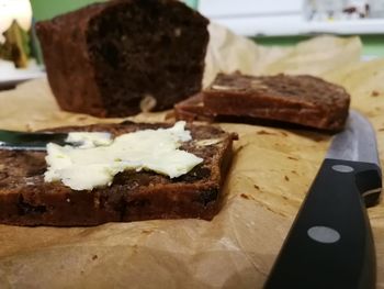 Close-up of cake served on table