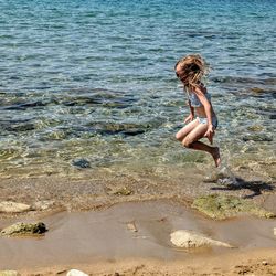 Full length of woman at beach